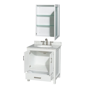 Wyndham Collection Vanity Wyndham Collection WCS141430SWHCMUNOMED Sheffield 30 Inch Single Bathroom Vanity in White, White Carrara Marble Countertop, Undermount Oval Sink, and Medicine Cabinet
