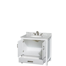 Load image into Gallery viewer, Wyndham Collection Vanity Wyndham Collection WCS141436SWHCMUNOMXX Sheffield 36 Inch Single Bathroom Vanity in White, White Carrara Marble Countertop, Undermount Oval Sink, and No Mirror